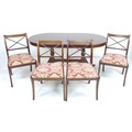 A modern reproduction extending dining table, in regency style, of D end form with twin pedestals an... 