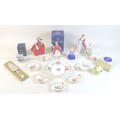 A collection of Royal Doulton figurines and other ceramics, including four Royal Doulton figurines S... 