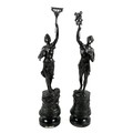 A pair of French Art Deco modernist bronzed spelter figures, each with named brass placque, 'L'Indus... 