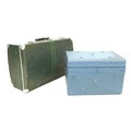 A vintage wooden box trunk with metal edges, studs and pins, later painted blue, with original paper... 