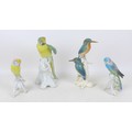 Four Karl Ens bird figurines, comprising a figural group of two Kingfishers perched amongst reeds, i... 