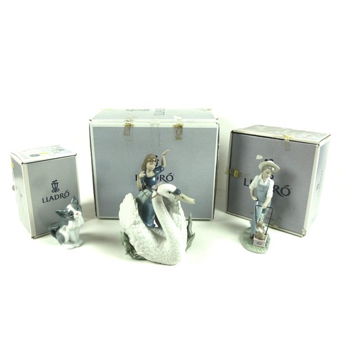 38 - A group of three Lladro figurines, comprising 'The Princess and The Swan', number 5705, 24cm high, S... 