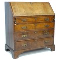 A George III mahogany bureau, inlaid decoration, fall front with fitted interior over four graduatin... 