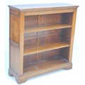 A good quality oak reproduction bookcase, in Georgian style, freestanding with closed back, the two ... 