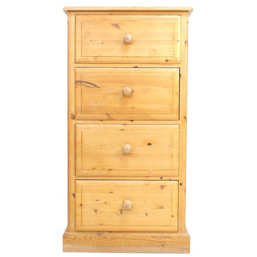 304 - A modern pine narrow chest of four drawers, with turned handles, 61 by 46 by 117cm high.