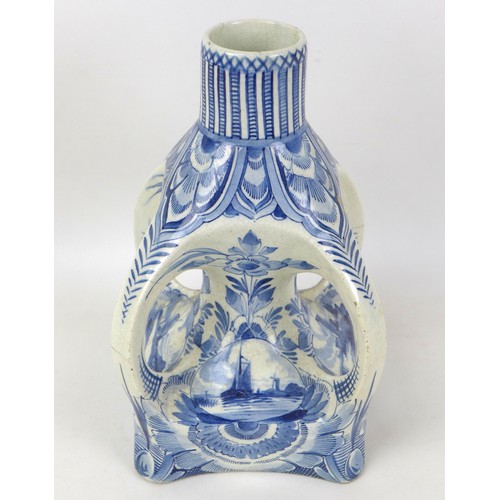 71 - A 19th century Delft tin glazed bottle vase, with four integral handles around the central column, o... 