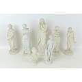 Seven Parian classical style female figurines, including a lady with a lady in robes with head parti... 