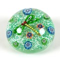A Paul Ysart style paperweight, the mottled green ground with dragon fly to the centre with green an... 