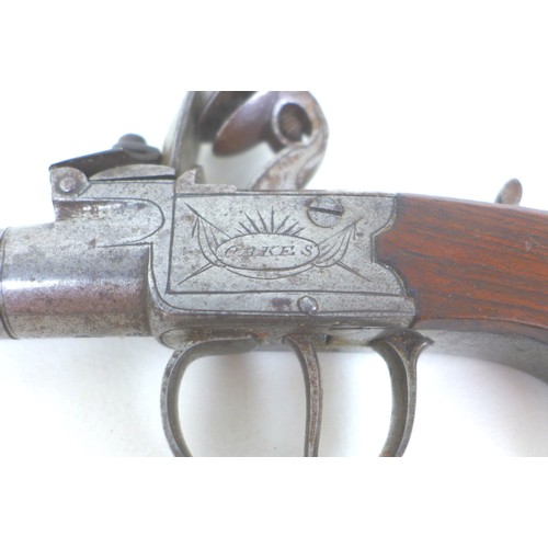 172 - An early 19th century flintlock boxlock pocket pistol by Oakes of Horsham, with slab sided walnut gr... 