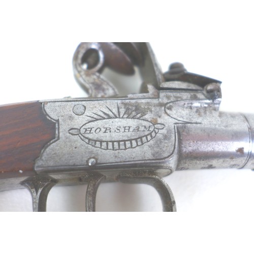 172 - An early 19th century flintlock boxlock pocket pistol by Oakes of Horsham, with slab sided walnut gr... 