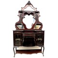 A late Victorian mahogany sideboard, with mirror back having two shelves to each side, the base with... 
