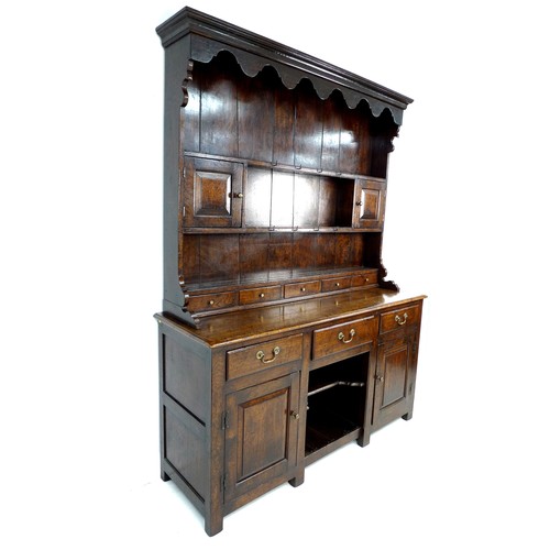 359 - A modern reproduction Georgian style oak Welsh dresser, circa 2000, shaped cornice over a closed bac... 