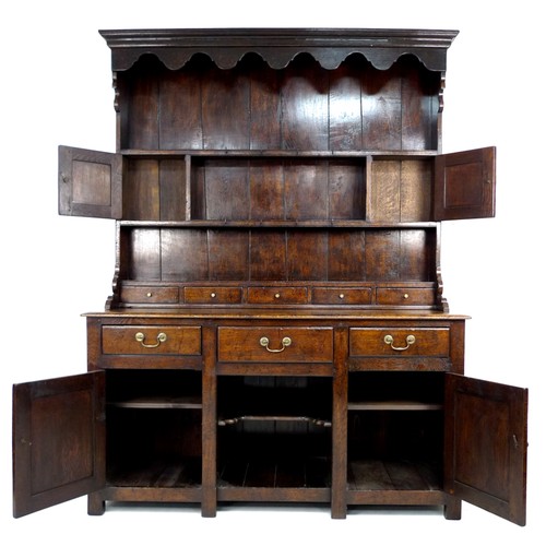 359 - A modern reproduction Georgian style oak Welsh dresser, circa 2000, shaped cornice over a closed bac... 