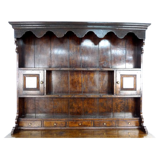 359 - A modern reproduction Georgian style oak Welsh dresser, circa 2000, shaped cornice over a closed bac... 