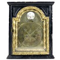 A 19th century Vienna mantel clock, in ebonised and gilt case, the foliate engraved 5