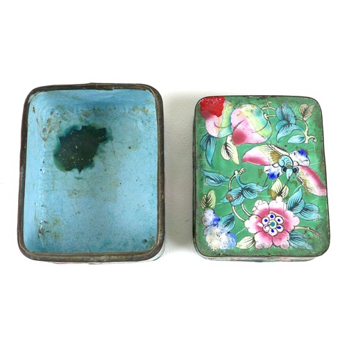 17 - A Chinese enamel box and cover, of rectangular section with rounded corners, decorated with sprays o... 