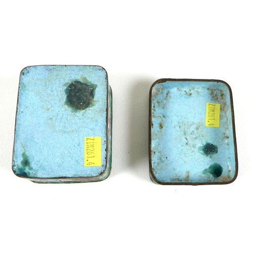 17 - A Chinese enamel box and cover, of rectangular section with rounded corners, decorated with sprays o... 