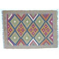 A Maimana Kelim rug, with multicoloured repeating diamond pattern and grey and cream border, 88 by 6... 
