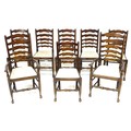 A set of eight 18th century style country ladder back dining chairs, late 20th century, including tw... 
