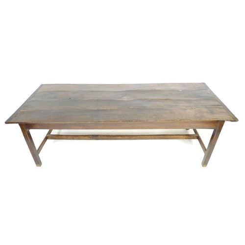 378 - A 18th century oak refectory table, the four plank surface with breadboard ends over a plain frame w... 