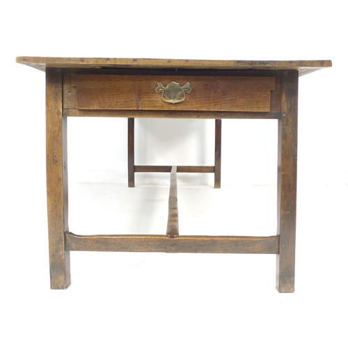 378 - A 18th century oak refectory table, the four plank surface with breadboard ends over a plain frame w... 