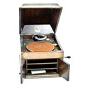 An Edwardian His Master Voice oak cased gramophone, caddy form lift lid opening to reveal the turnta... 