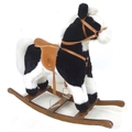 A Mama & Papas plush piebald rocking horse, with saddle and bridle on bow rocker, 30.5 by 93.5 by 82... 