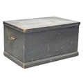 A vintage pine chest, painted black, with candle box, metal carry handles, 79 by  48.5 by 42cm high.
