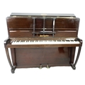 An Edwardian upright piano, by Boyd, London, 133 by 53 by 109cm high.
