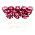 A set of twelve Bohemian glass hock glasses, with cranberry flashed glass bowls, raised on hexagonal... 