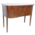 A George III mahogany sideboard, with two drawers to the centre, cupboard and deep drawer to the sid... 