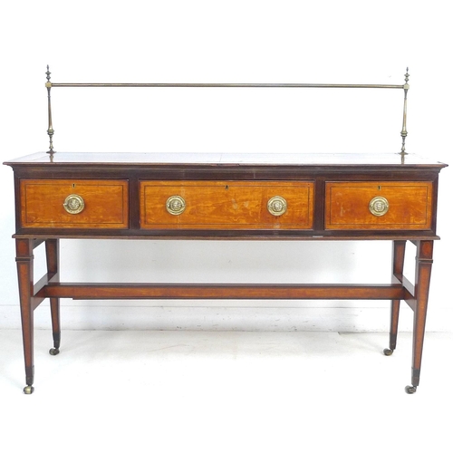 232 - A Regency mahogany and inlaid sideboard, with brass pole upstand, three frieze drawers with oval bra... 