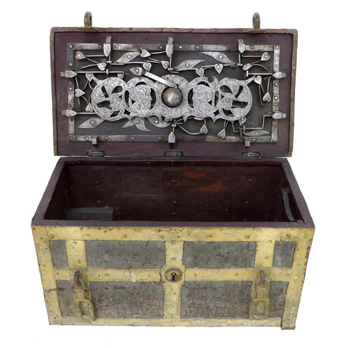 239 - A 17th century heavy cast iron strong box or 'Armada' chest, probably German, with working key, of r...