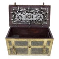 A 17th century heavy cast iron strong box or 'Armada' chest, probably German, with working key, of r... 
