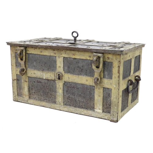 239 - A 17th century heavy cast iron strong box or 'Armada' chest, probably German, with working key, of r... 