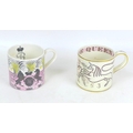 Two Wedgwood 1953 ERII Coronation mugs, one designed by Eric Ravilious with pink and yellow colourin... 