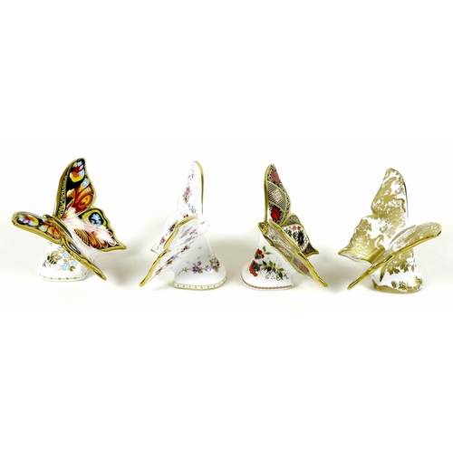 45 - A group of four Royal Crown Derby paperweights, all modelled as butterflies, comprising 'Peacock But... 