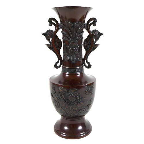 5 - A modern Chinese bronzed vase, of baluster form with long flared neck having pierced and scrolled ha... 