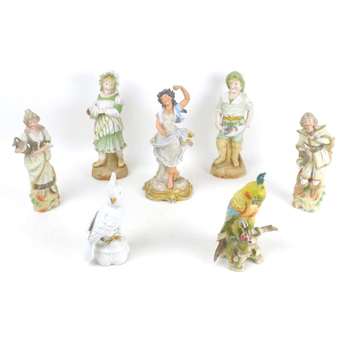 50 - A group of seven continental porcelain and bisque figurines, comprising two porcelain cockatoos, an ... 