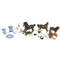 A collection of five Beswick animal figurines, comprising Shire Horse number 975, 21cm high, bay Tho... 