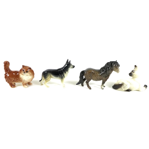 51 - A collection of five Beswick animal figurines, comprising Shire Horse number 975, 21cm high, bay Tho... 