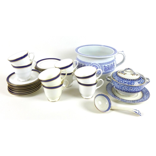 58 - A Royal Worcester part tea service in the Howard pattern, comprising eight cups, 8cm high, saucers, ... 