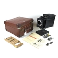 An Ensign Optiscope No 6 Lantern Slide Projector, a/f missing lens, 31cm high, with wooden Jay-Nay s... 