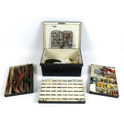 85 - An Edwardian metal fly fishing tackle box, by C. Farlow & Co Ltd London, with three lift out trays c... 