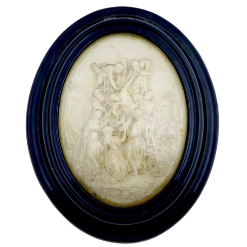 86 - An Italian 19th century cast plaster relief oval plaque, depicting Christ being lowered from the cro... 