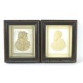 A pair of 19th century plaster relief plaques, titled 'Petrus' and 'Paulus', depicting the profile p... 