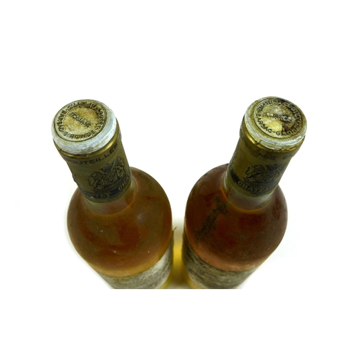 89 - Two bottles of Chateau Coutet a Barsac, Premier Cru Classe, 1985, U: both base neck. (2)