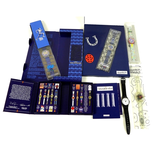 111 - A collection of Swatch watches and badges, comprising Swatch 'Lucky 7' Club Watch 98, in original bo... 