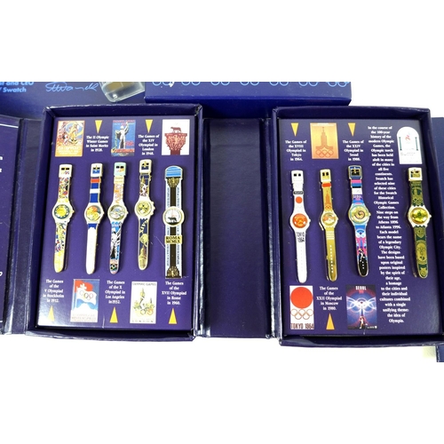 111 - A collection of Swatch watches and badges, comprising Swatch 'Lucky 7' Club Watch 98, in original bo... 