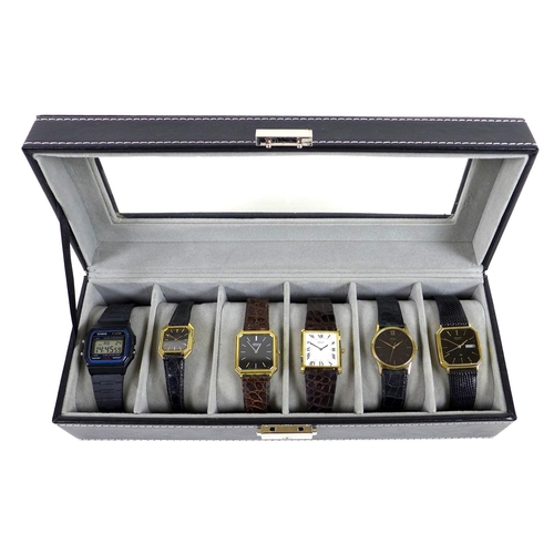 112 - A group of five vintage Seiko gold plated gentleman's quartz wristwatches, four with black dials and... 